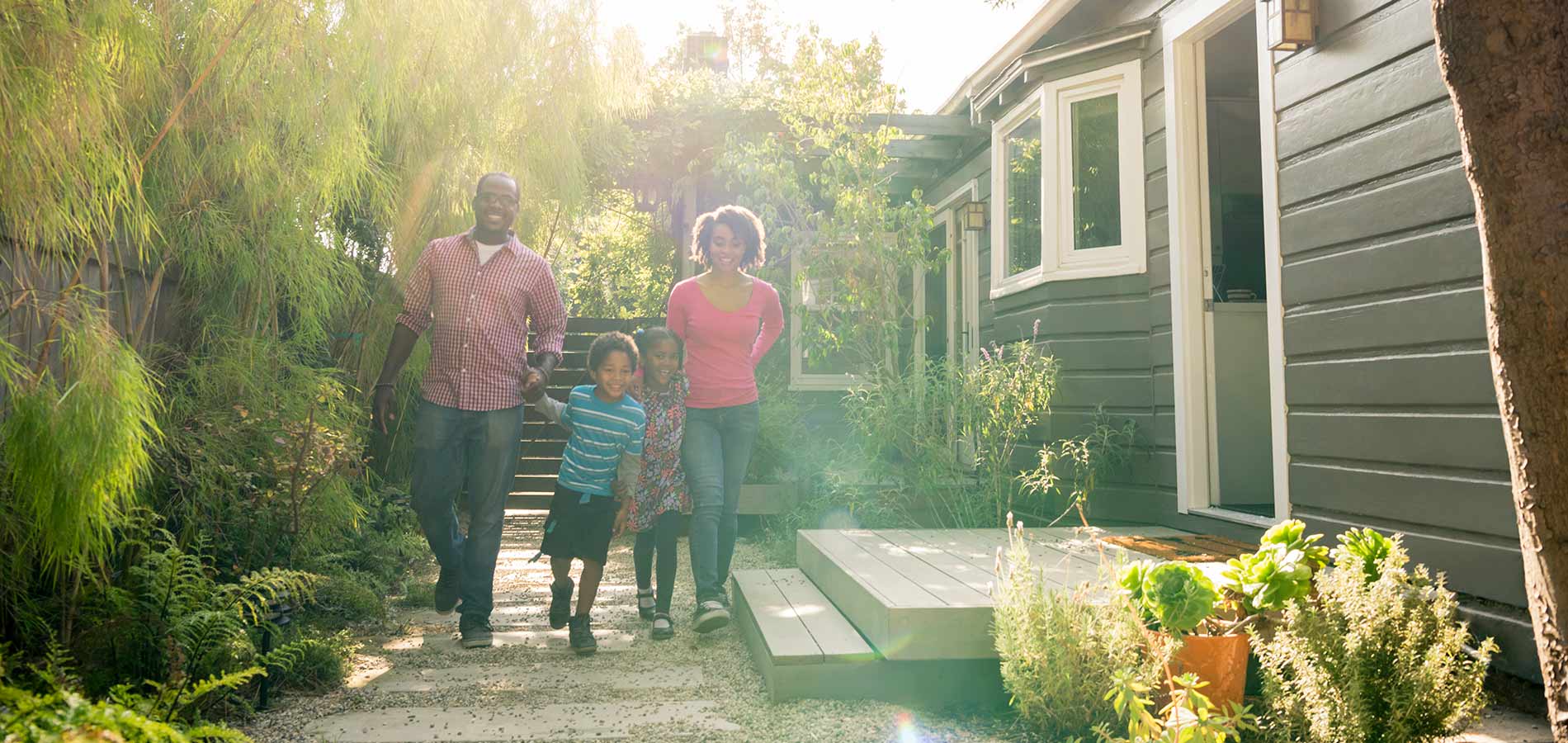 Family Playing Outside of Home