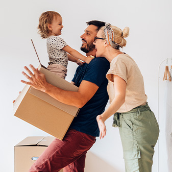 dad playing with children at home